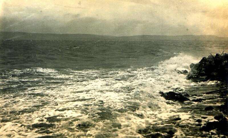 Stormy sea at rocky shore