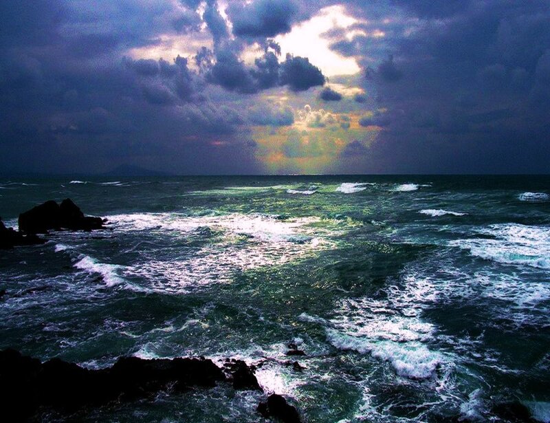 Stormy sea at sunset