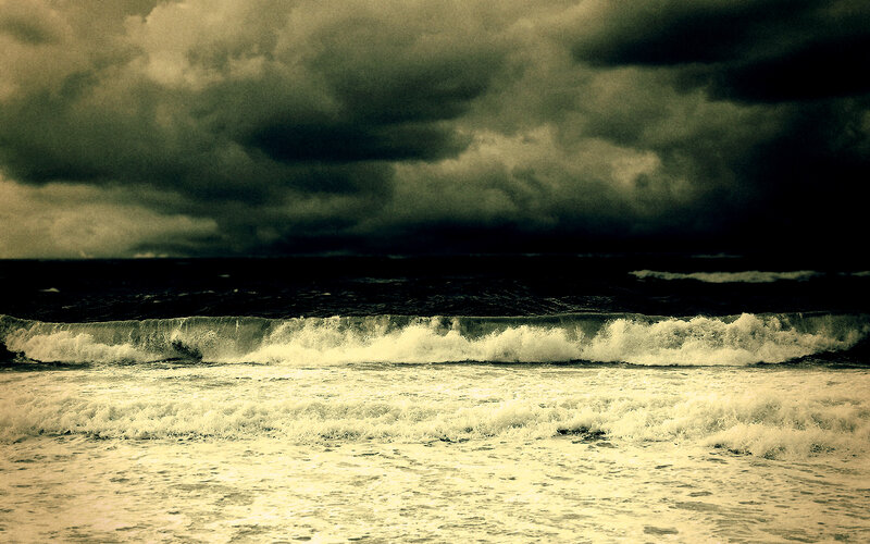 Stormy sea under dark clouds