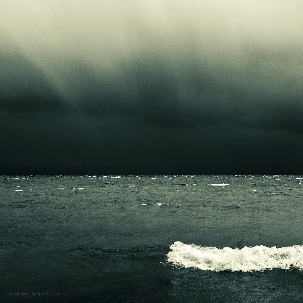 Stormy sea under dark clouds