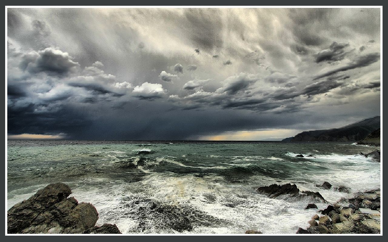 Stormy sea with dark clouds