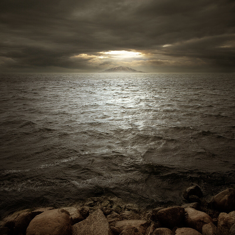Stormy sea with distant island
