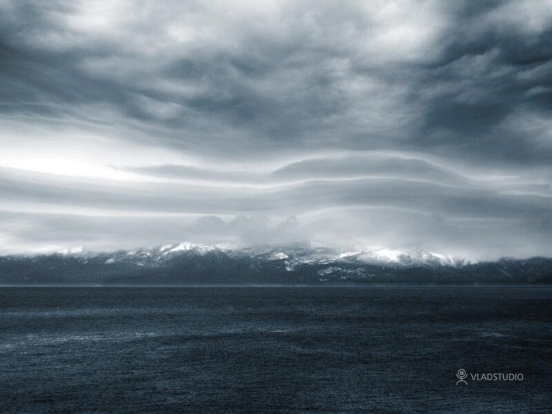 Stormy sea with distant mountains