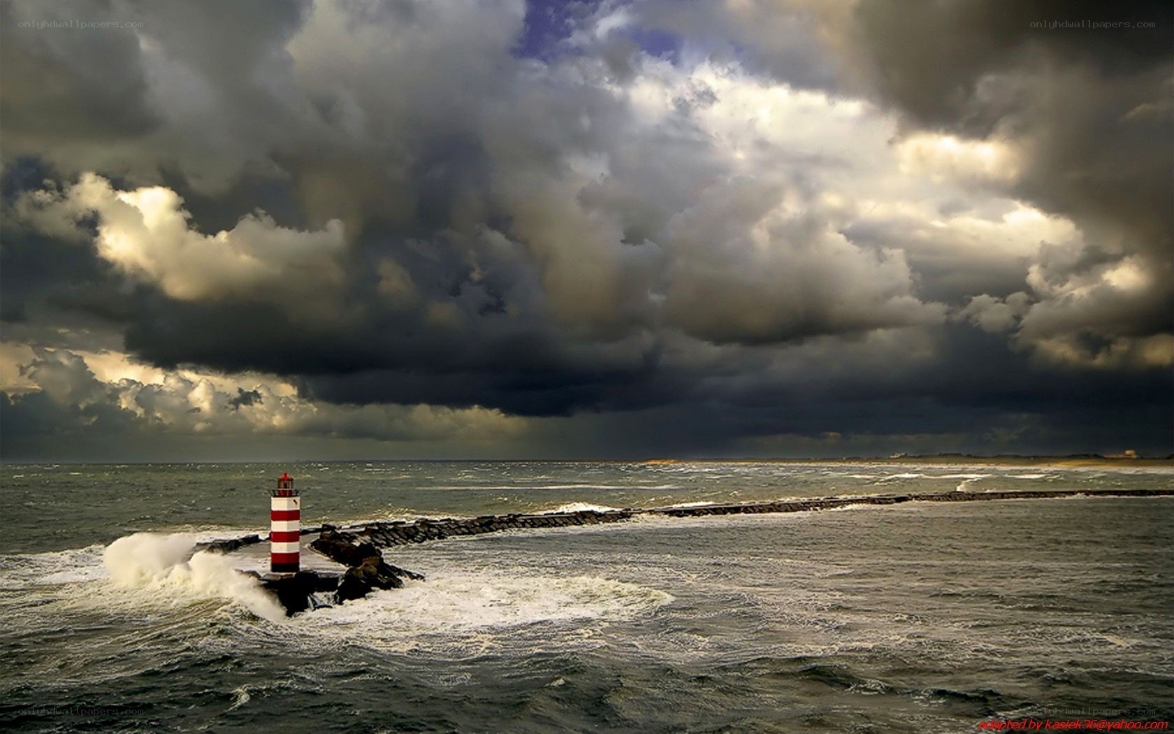 Stormy sea with lighthouse