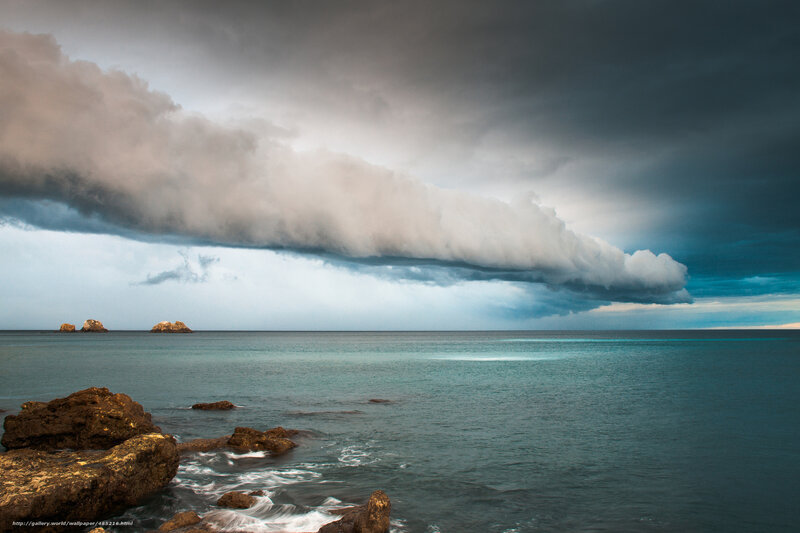 Stormy sea with rocky shore