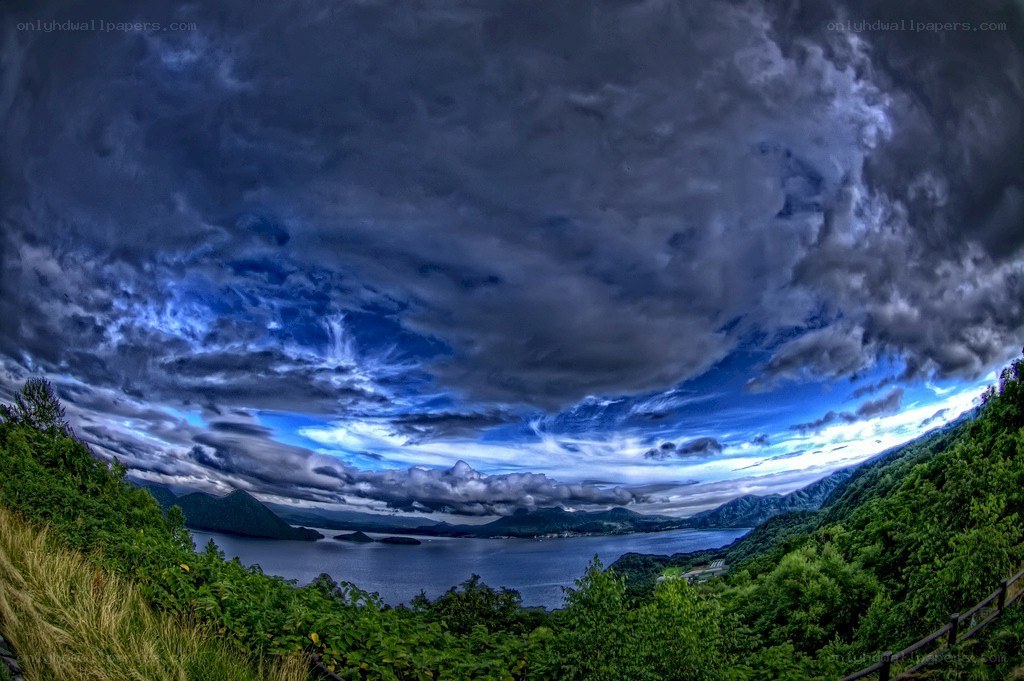Stormy sky over a mountain lake
