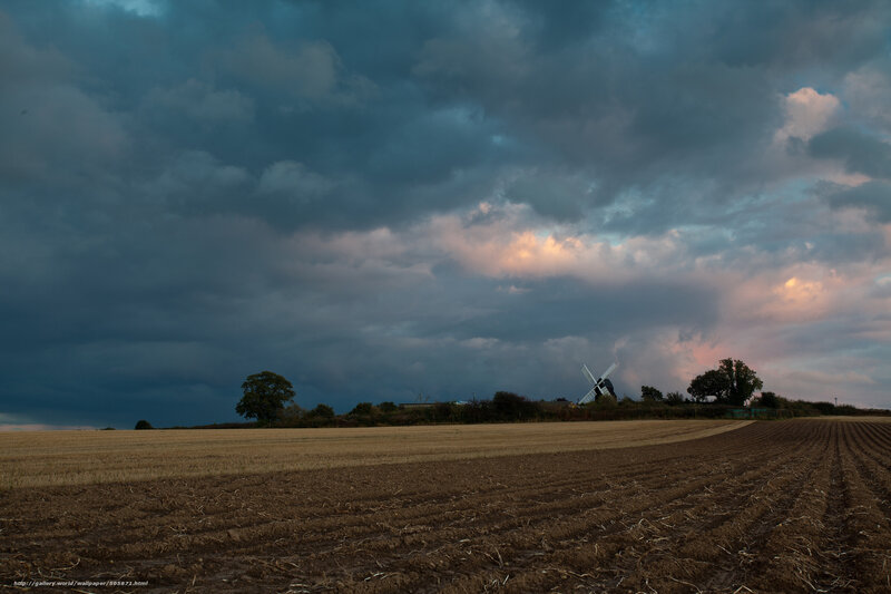 Stormy sky over a windmill