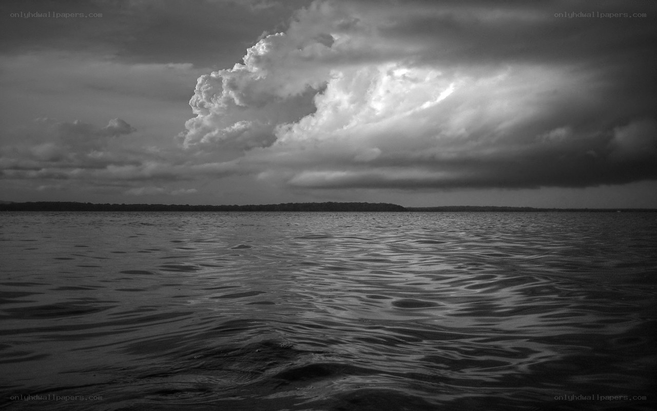 Stormy sky over calm water