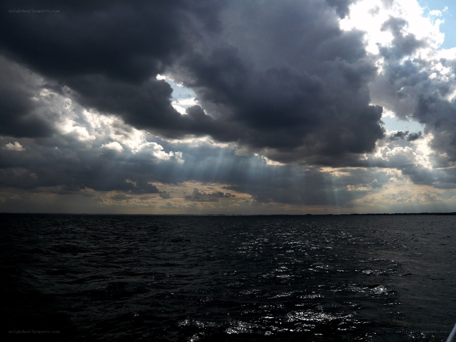 Stormy sky over dark water