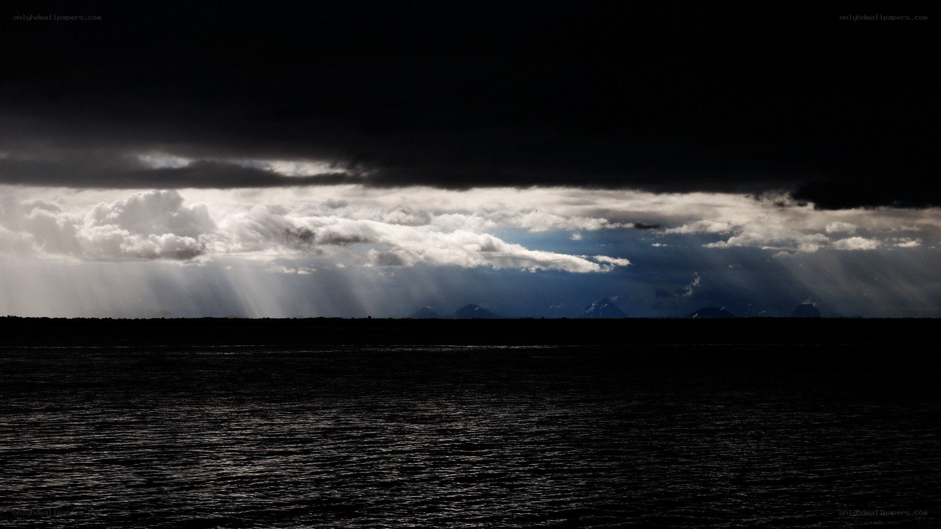 Stormy sky over dark water
