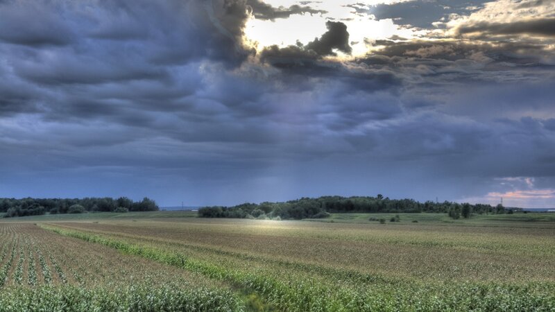 Stormy sky over farmland