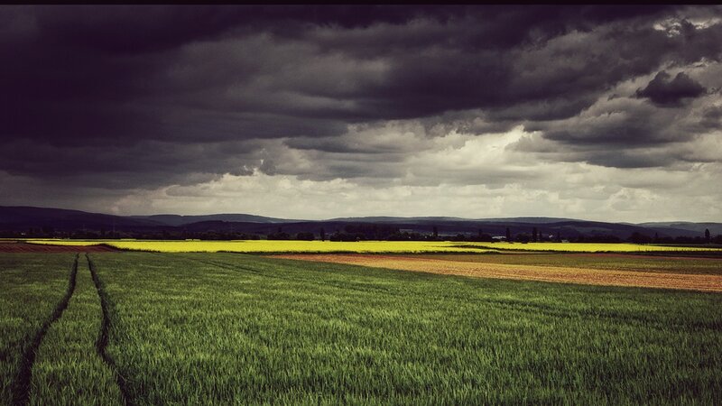 Stormy sky over farmland