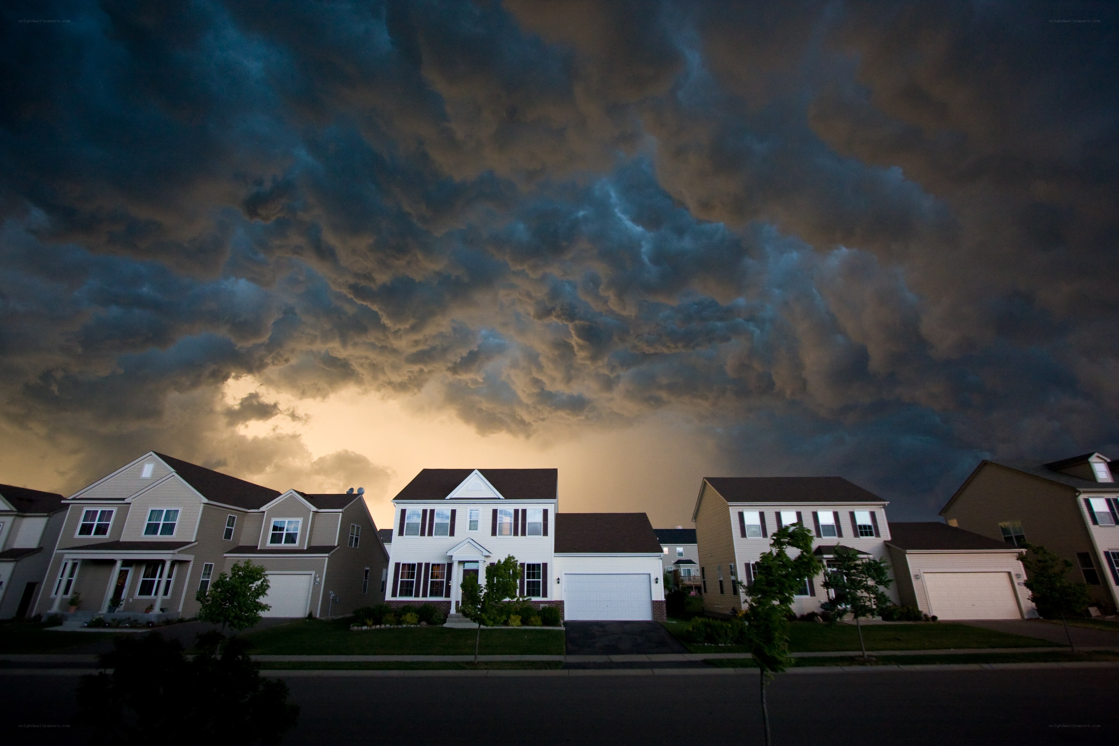 Stormy sky over suburban homes