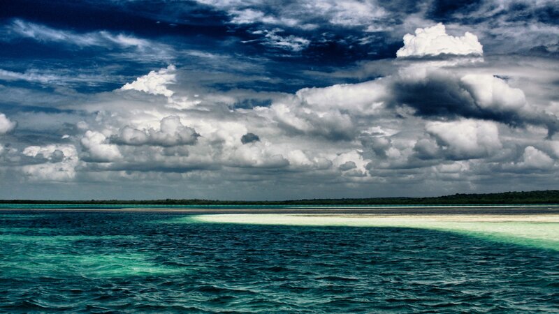 Stormy sky over turquoise sea