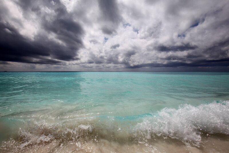 Stormy sky over turquoise sea