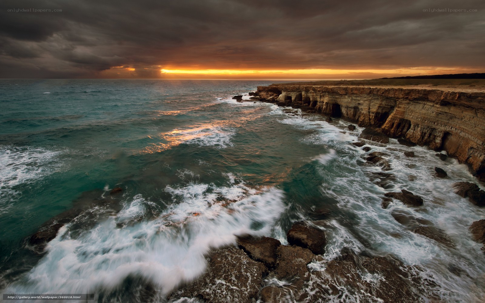 Stormy Sunset at Coastal Cliffs