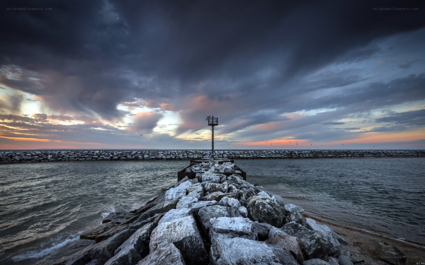Stormy sunset at the pier