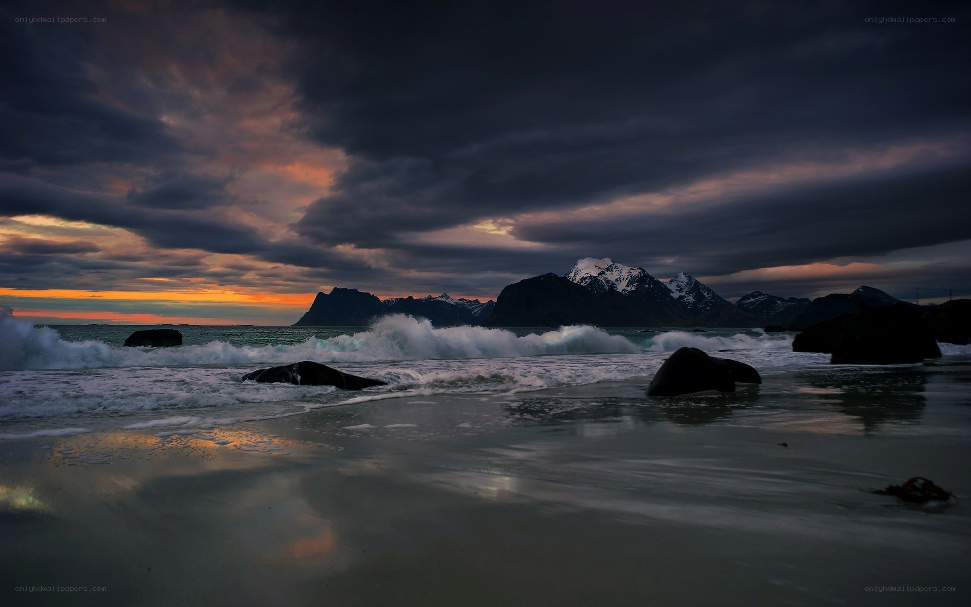 Stormy sunset over coastal mountains