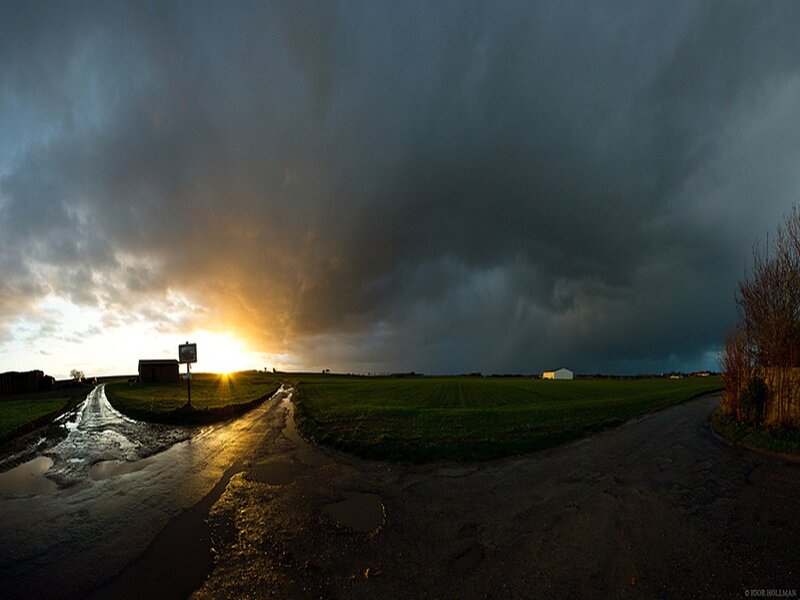 Stormy Sunset over Fields