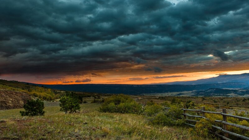 Stormy Sunset over Hills