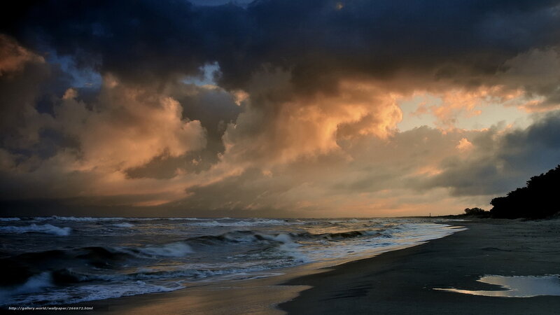 Stormy sunset over the beach