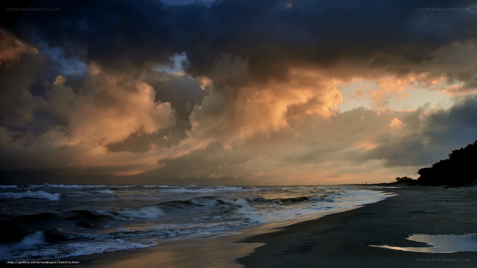 Stormy sunset over the beach