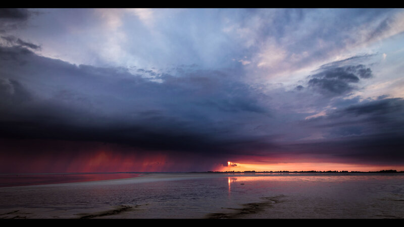 Stormy Sunset over Water