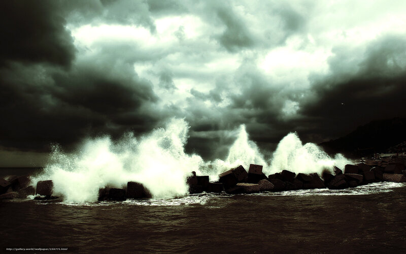 Stormy waves crash on breakwater