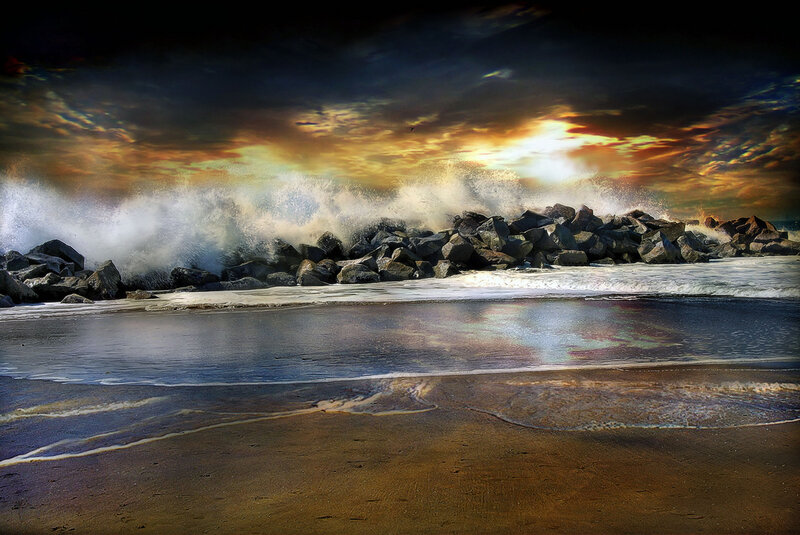 Stormy waves crash on rocky shore