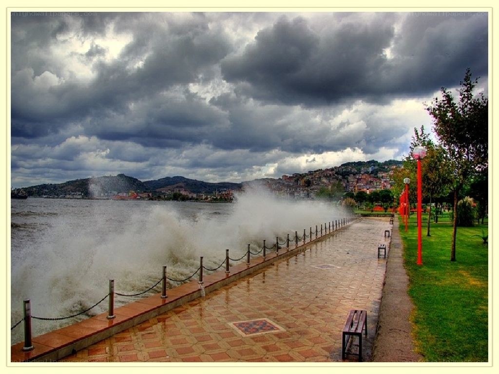 Stormy waves hit the promenade