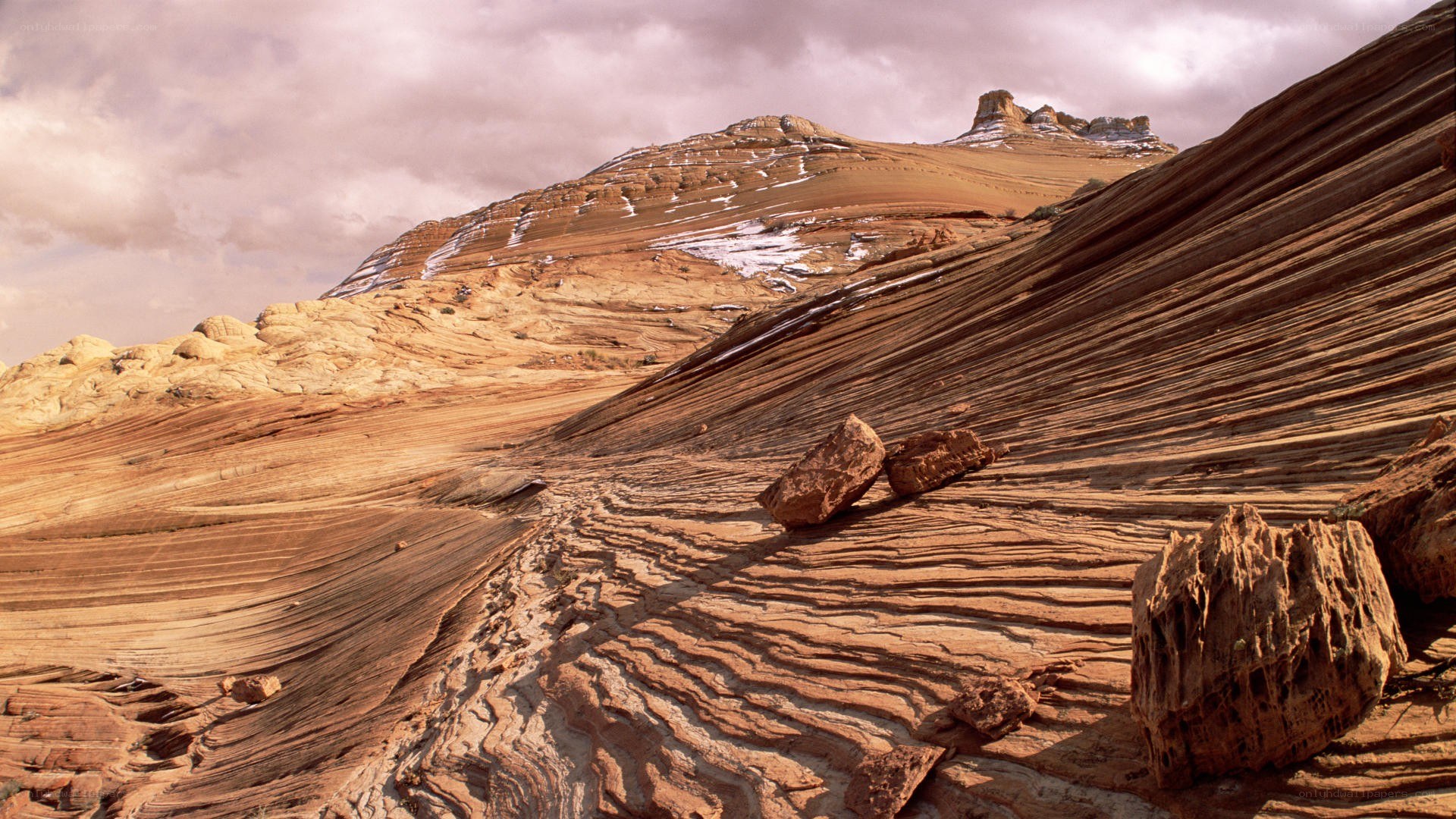 Stratified rock formations in desert