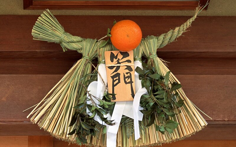 Straw Doll with Orange