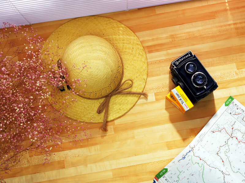 Straw hat and vintage camera