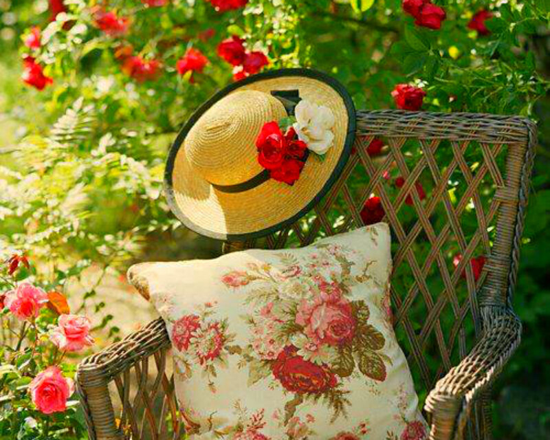 Straw Hat on Wicker Chair