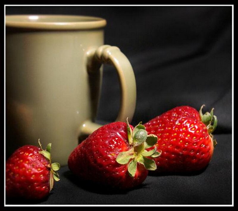 strawberries and a mug