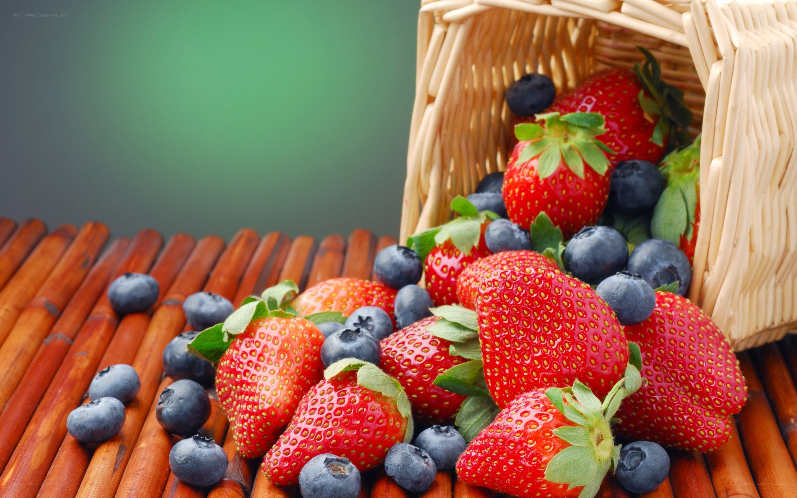 strawberries and blueberries in basket