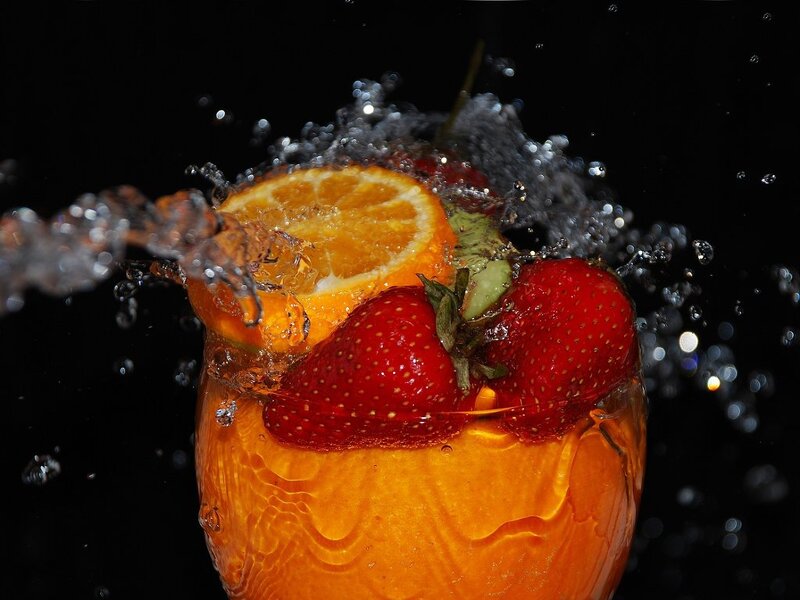 Strawberries and Orange in Drink