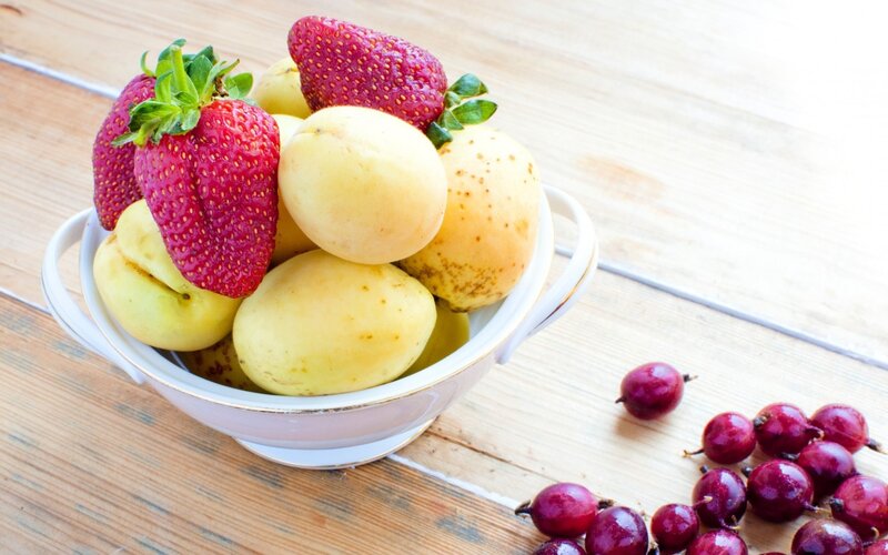 Strawberries and Plums in Bowl