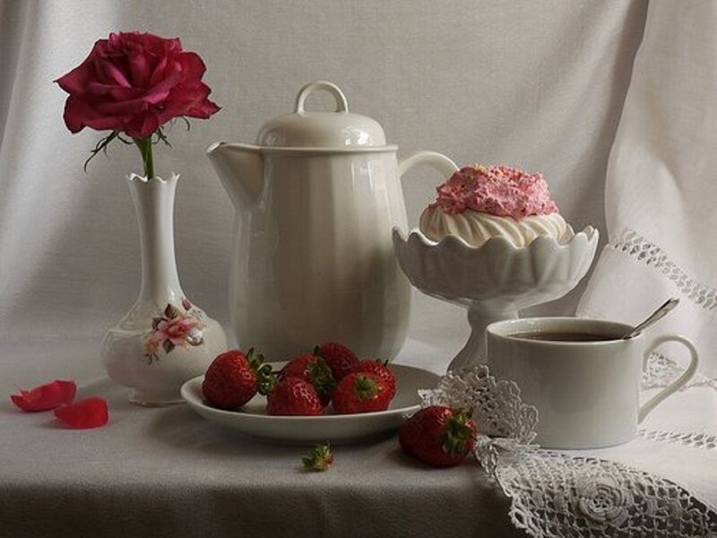 Strawberries and Rose on Table