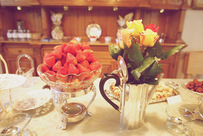 Strawberries and Roses on Table