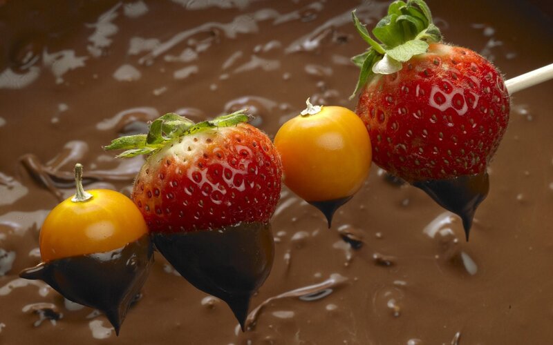 strawberries and tomatoes dipped in chocolate