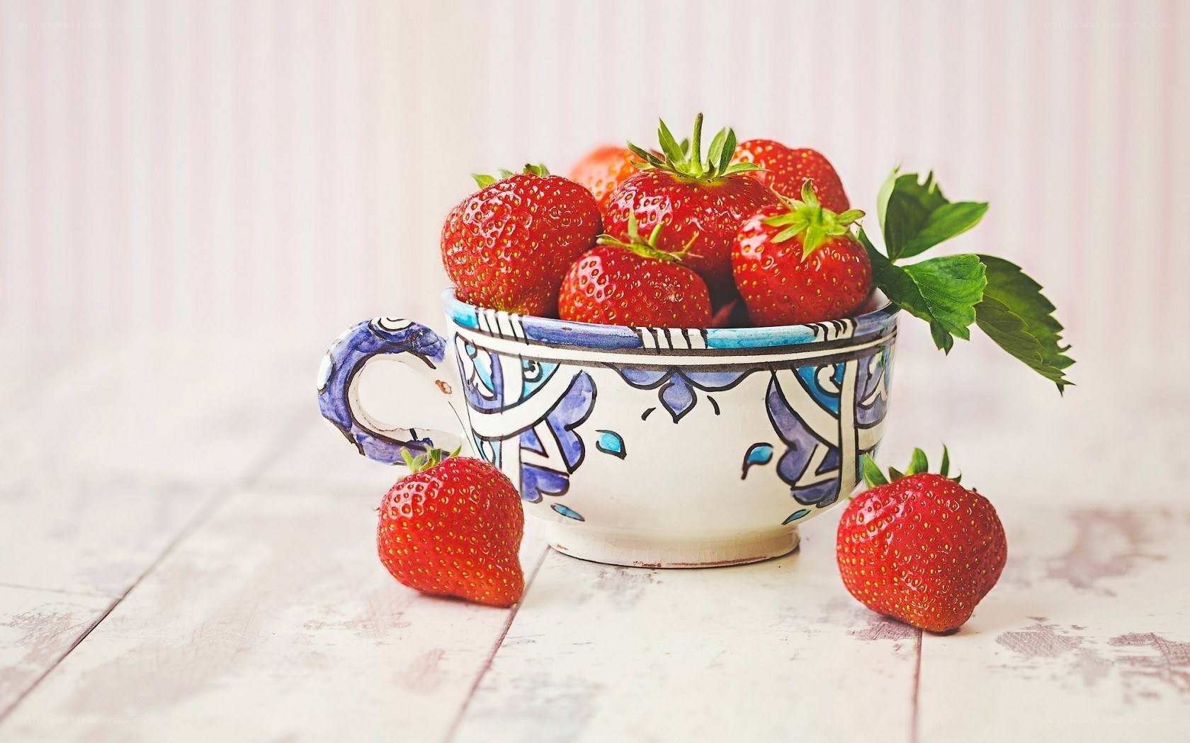 Strawberries in a decorative cup