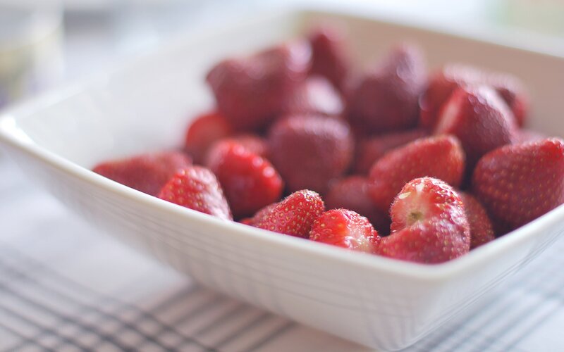 strawberries in a white bowl