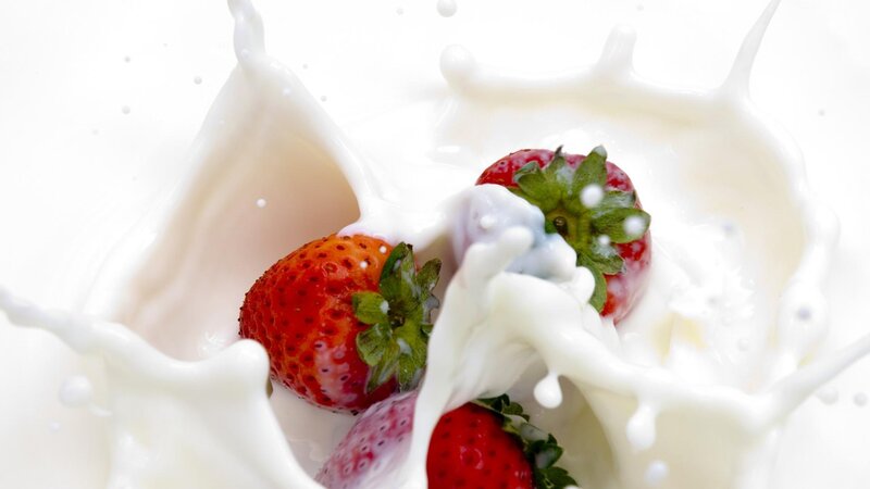 Strawberries in Milk Splash — White, Dynamic, Photograph