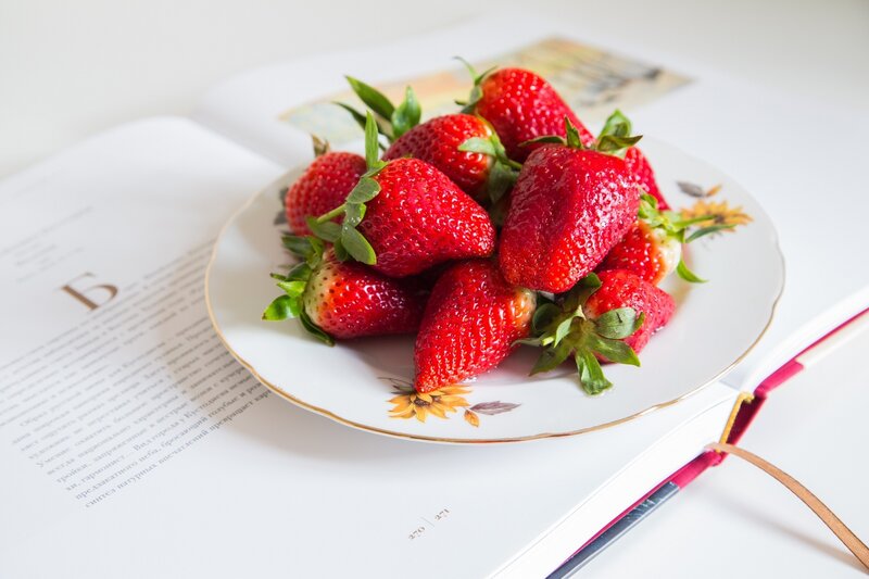 strawberries on a book