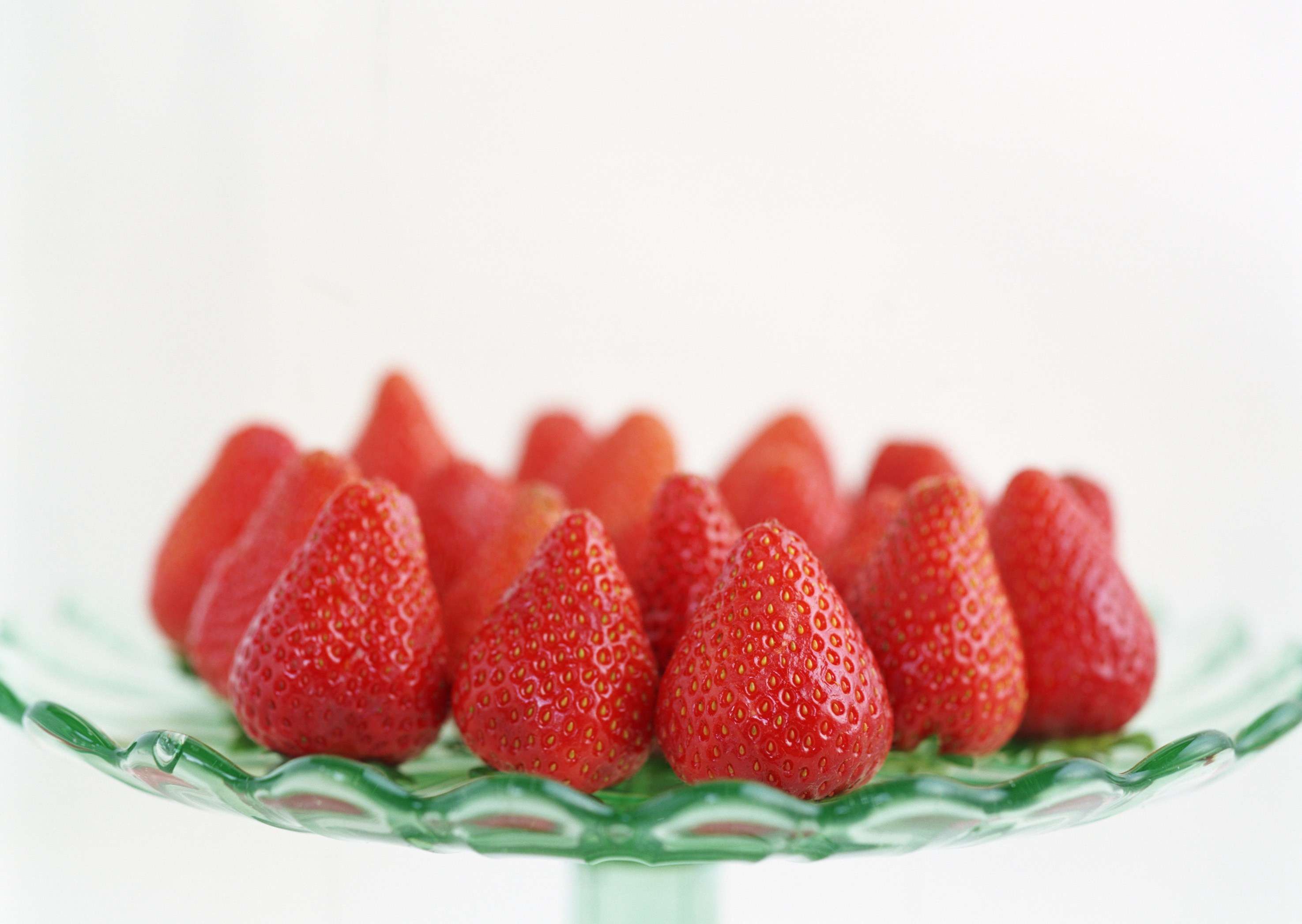 Strawberries on a green dish