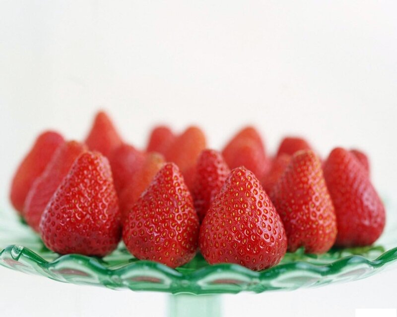 Strawberries on a green dish