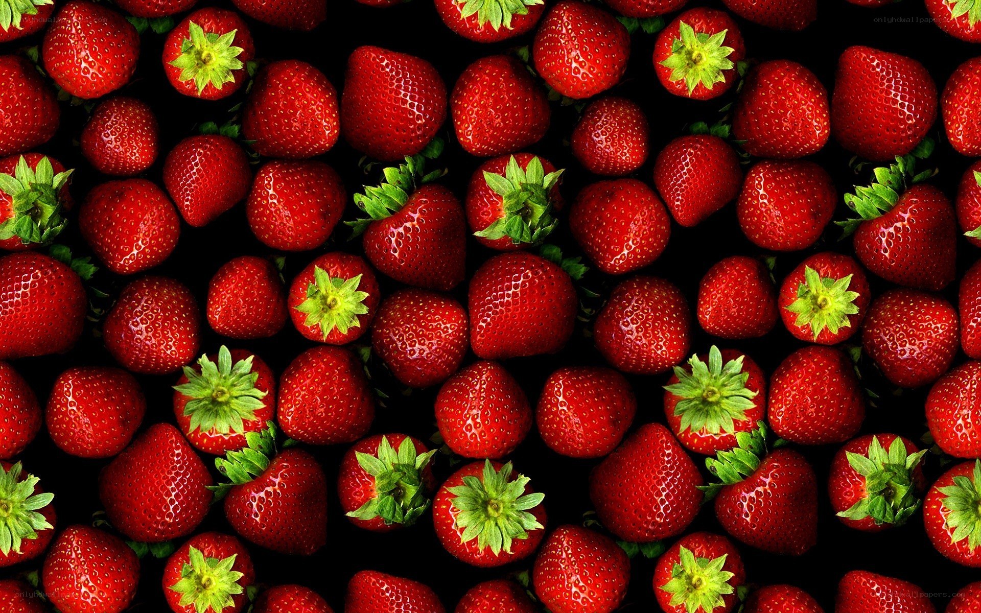 strawberries on black background