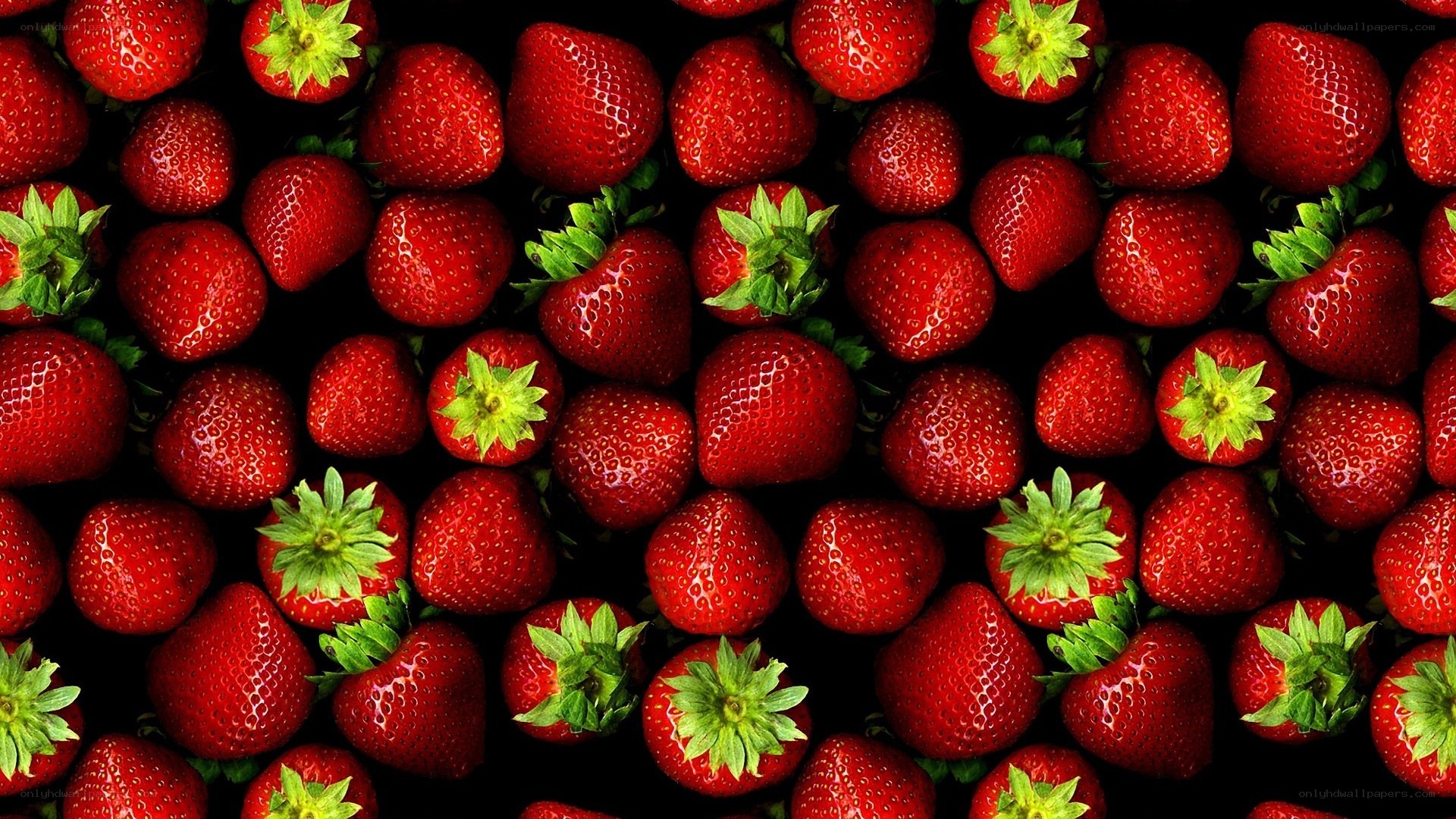 strawberries on black background