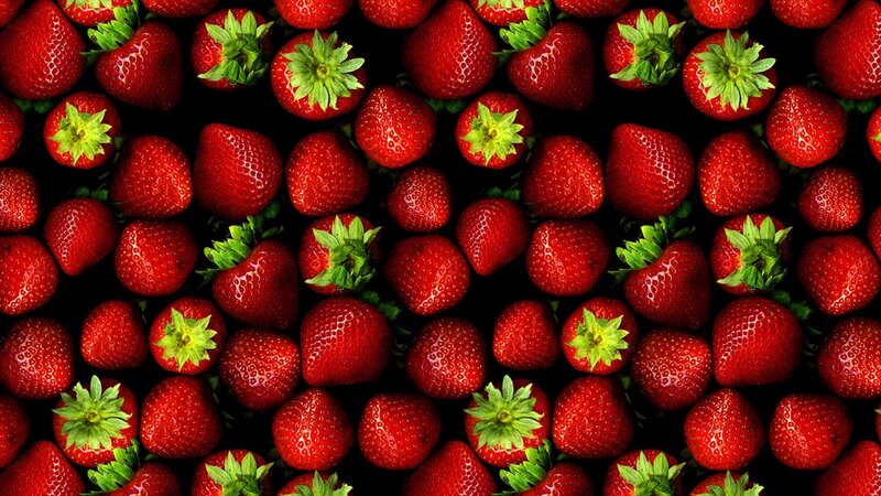 strawberries on black background